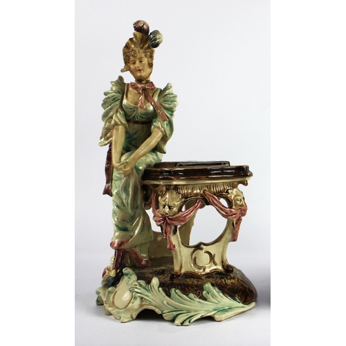 19 - A pair of continental figures of chess players, modelled as a male and female figure in 18th century... 