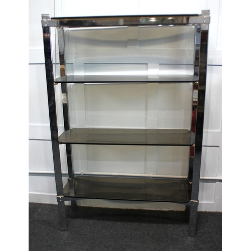 A vintage Merrow Associates chrome and smoked glass shelf unit ...