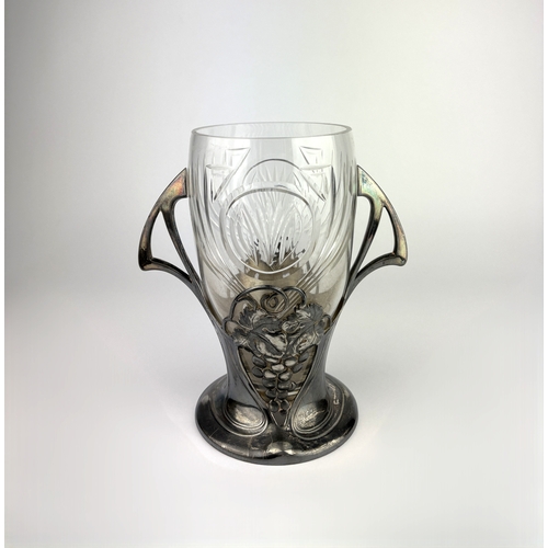 66 - An Art Nouveau WMF (Württembergische Metallwarenfabrik) pewter celery stand or vase, with grape deco... 