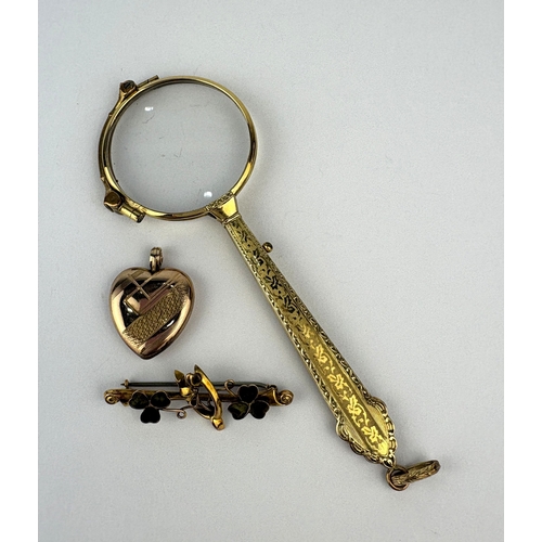 124 - A gold and Connemara marble bar brooch detailed 9ct, a gold heart shaped pendant locket detailed 9ct... 