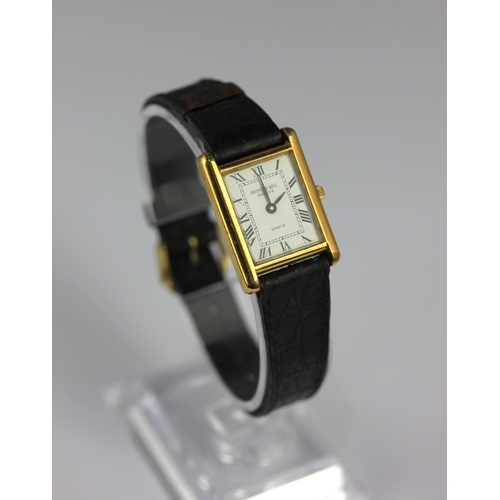130 - A Raymond Weil quartz gilt metal rectangular cased ladies wristwatch, fitted with a strap and the or... 