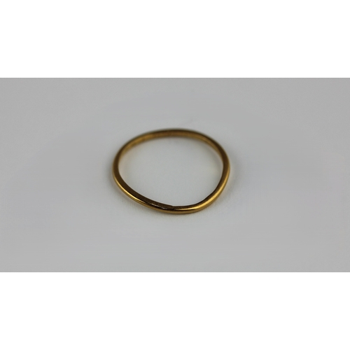 147 - A 22ct gold thin wire wedding ring size L and weight 1g.