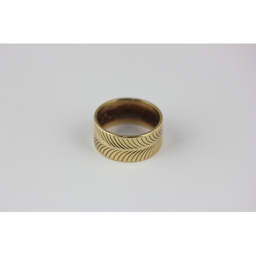 150 - A 9ct gold wide band wedding ring with facet cut herringbone decoration, ring size N and weight 4.8g... 