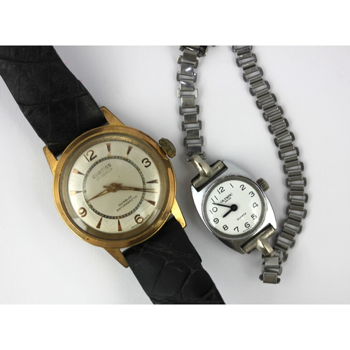 157 - A Curtiss gilt metal fronted and steel backed gentlemans wristwatch and an Olympic quartz ladies wri... 