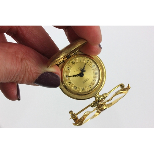 164 - A Klarlund gold cased keyless wind hunting case ladies fob watch detailed 18K 0.750 with a gold and ... 