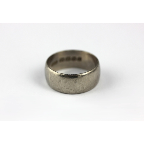 166 - An 18ct white gold plain wide band wedding ring, London 1966, size R, gross weight 9.4g
 ... 