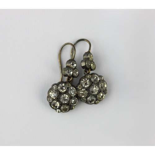 170 - A pair of silver and foil backed colourless paste pendant cluster earrings the tops having wire fitt... 