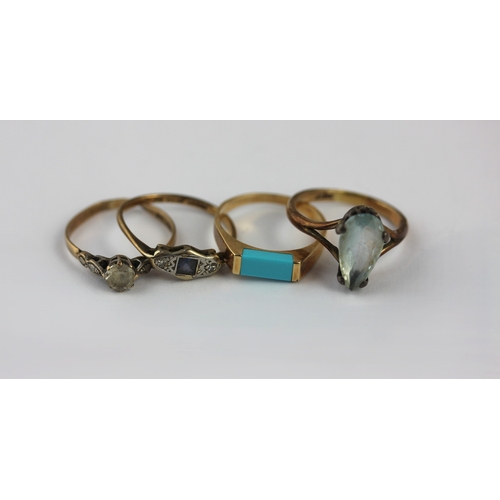 35 - A gold and turquoise set panel shaped ring detailed 585, size M, gross weight 1.9g, a sapphire and d... 