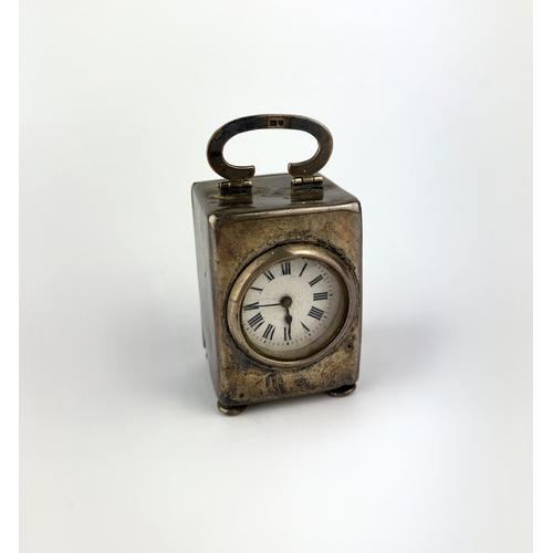 371 - A George V silver cased miniature travelling desk clock, case by Needham Bros., London, 1911, white ... 