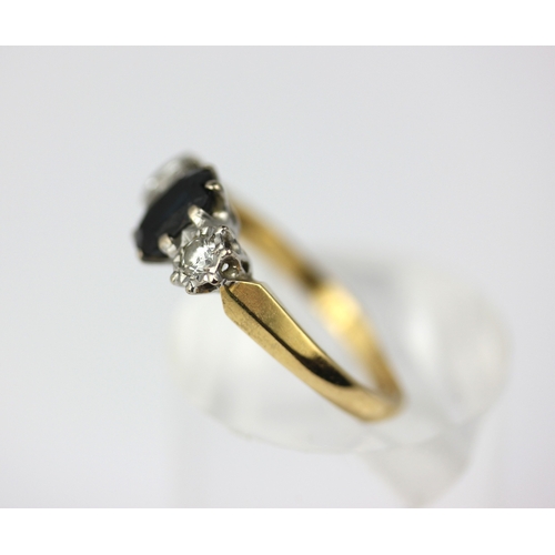 38 - A 18ct gold sapphire and diamond three stone ring claw set with the oval cut sapphire at the centre ... 