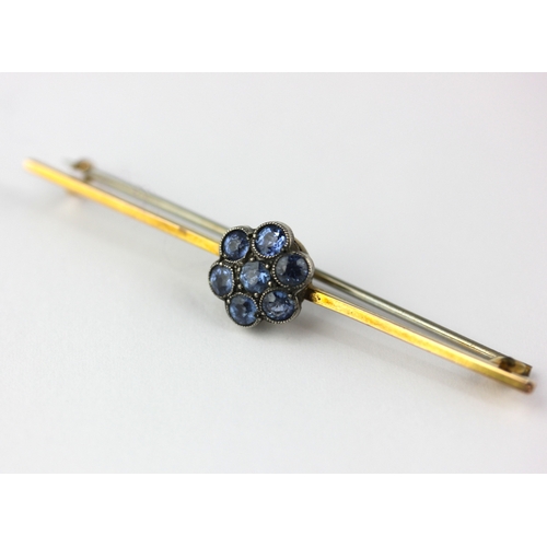 39 - A gold and silver set, sapphire seven stone cluster bar brooch detailed 9ct & SIL gross weight 2... 