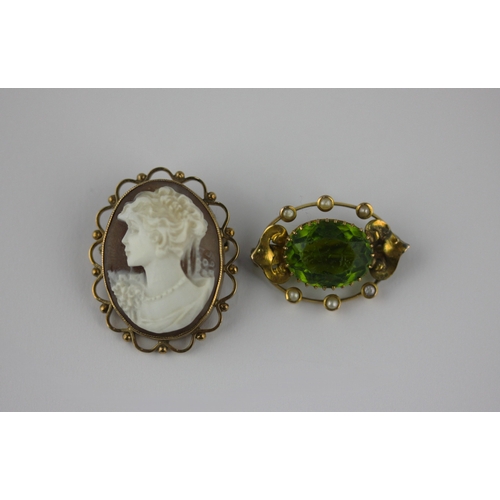 43 - A 9ct gold mounted oval shell cameo brooch carved as a portrait of a lady and a gold mounted green p... 