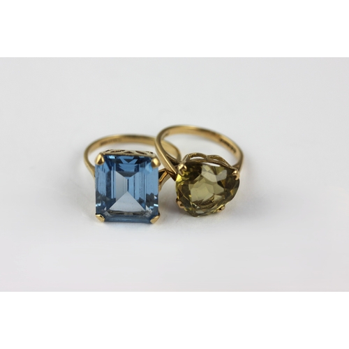 47 - A 9ct gold ring claw set with a citrine, London 1969, size I and a 9ct gold ring claw set with a rec... 