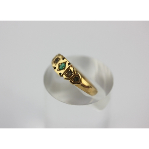 54 - An 18ct gold ring set with a central emerald, the four further gems lacking, Birmingham 1902, size O... 