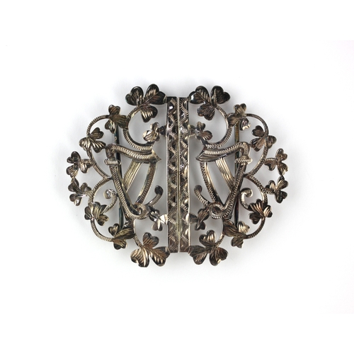 56 - A silver brooch with two harp and shamrock motifs as converted from a two-piece buckle, Birmingham 1... 