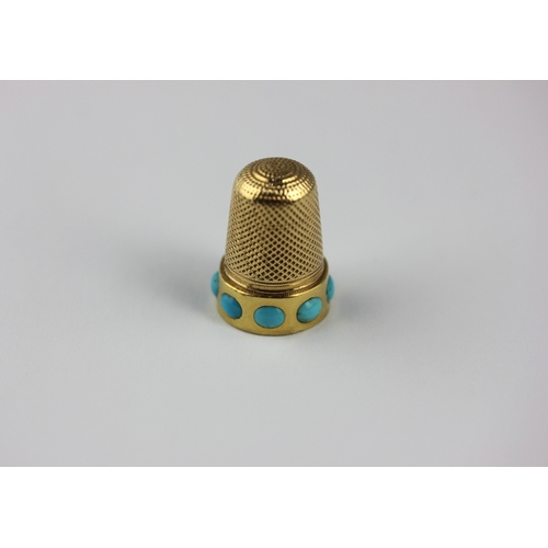 9 - A gold and turquoise thimble, the base set with eight oval turquoises, gross weight 5.2g... 