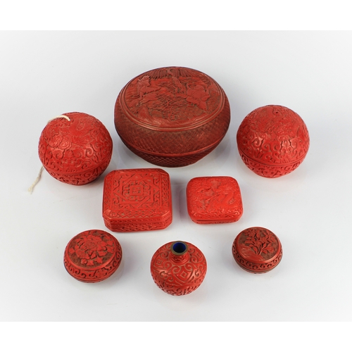 156 - A collection of eight Chinese cinnabar lacquer items, 20th century, including; two spherical boxes a... 