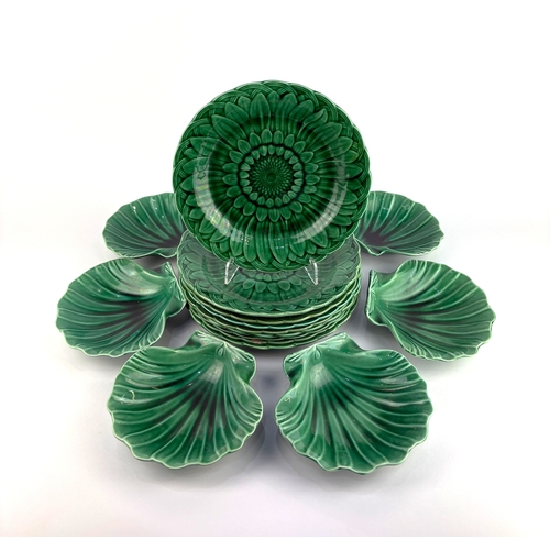 81 - A set of nine 19th century Wedgwood green glazed majolica dishes relief moulded with foliate and bas... 
