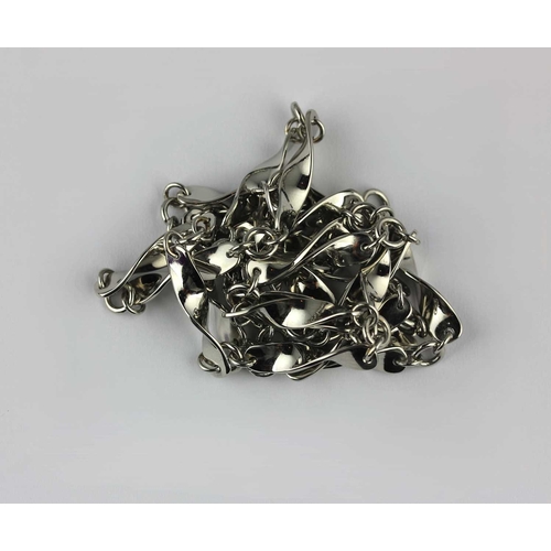 A platinum necklace in ribbon twist link design on a bolt ring clasp ...