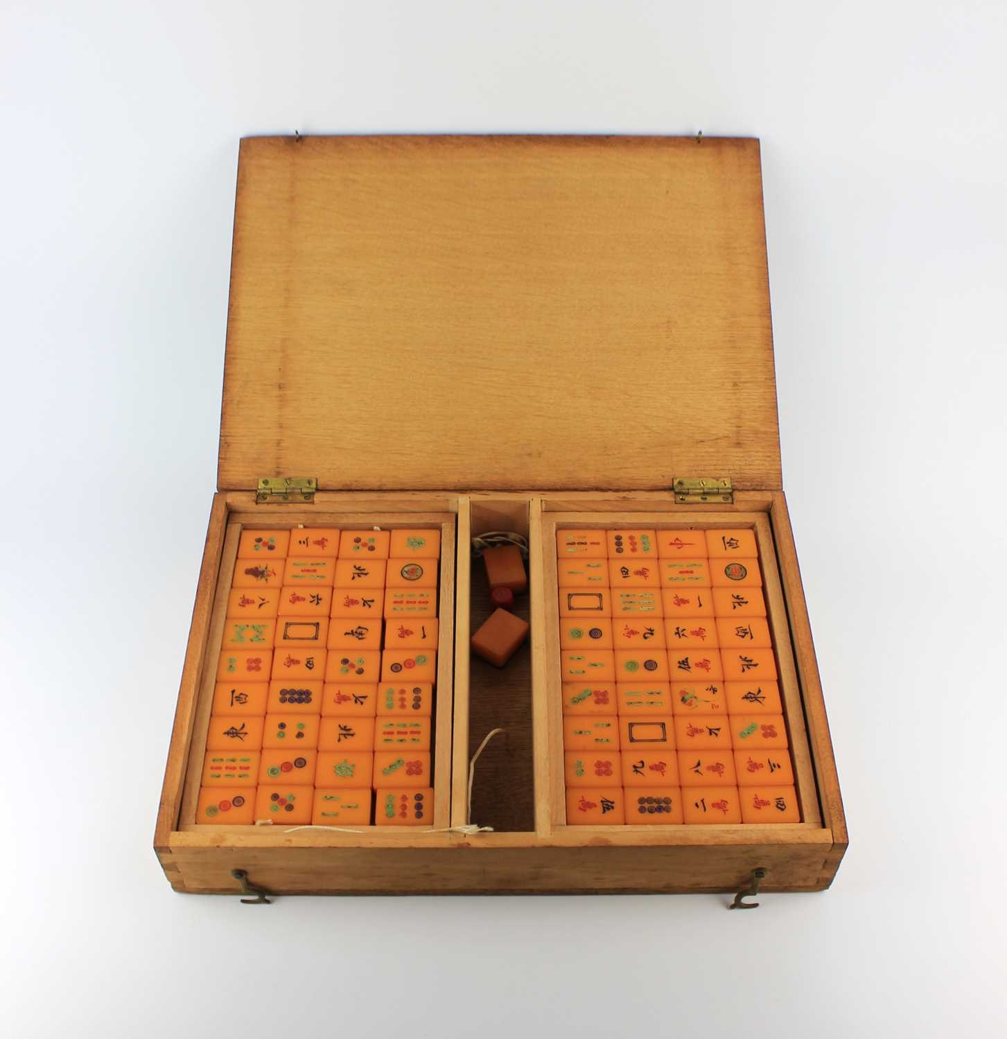 A Chinese Mahjong set, resin/plastic form, in a small chest, no sticks