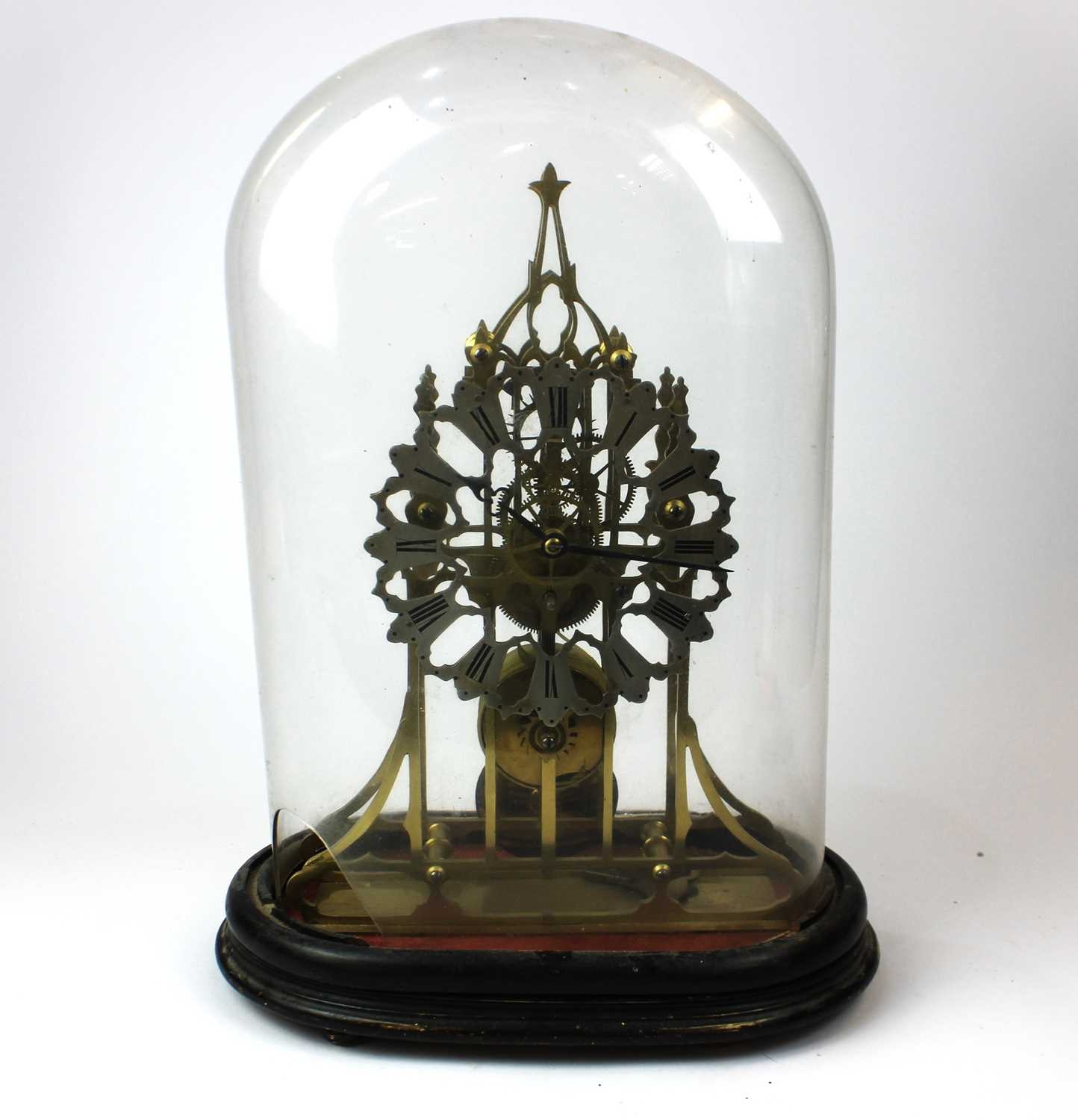 A brass skeleton mantle clock with fusee movement approx 35cm high ...
