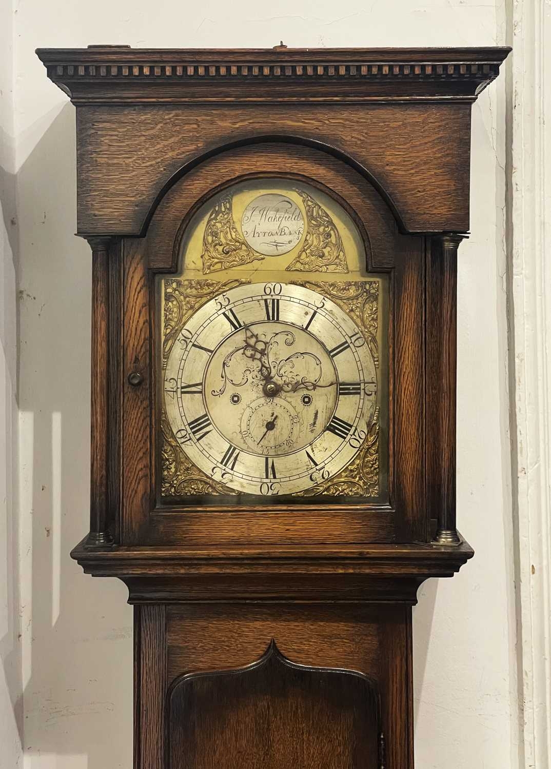 A late Georgian country made oak cased striking 30 hour longcase clock ...