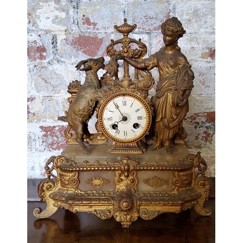 15 - Louis XVI style gilt metal mantel clock, 19th Century, surmounted with maiden feeding goat, boldly c... 