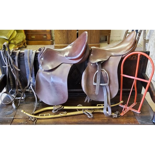 43 - Equestrian - A Barnsby leather 17'' pony jumping saddle; another 17'' pony jumping saddle; leather p... 