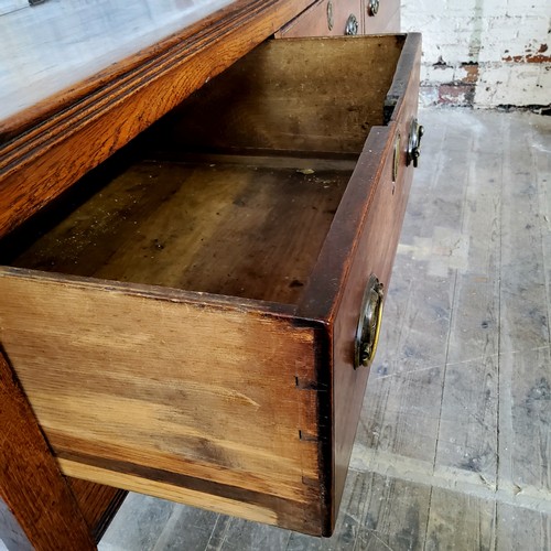 45 - An 18th century country house oak dresser base,well figured, holding three long drawers to frieze, s... 