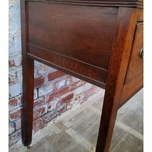 45 - An 18th century country house oak dresser base,well figured, holding three long drawers to frieze, s... 