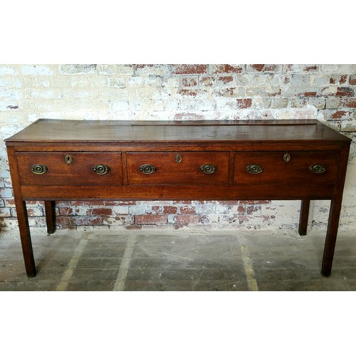 45 - An 18th century country house oak dresser base,well figured, holding three long drawers to frieze, s... 