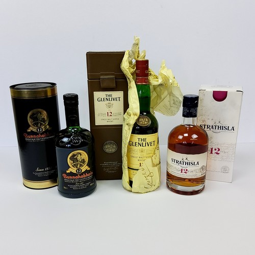 53 - Whisky - A Bunnahabhain 12 year single Islay malt scotch; a Glenlivet 2 year single malt scotch; a S... 