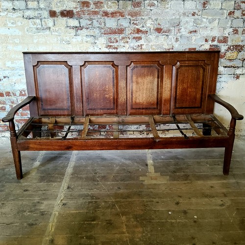 73 - An 18th century country house oak settle, four section walnut inlaid panelled back support, period i... 