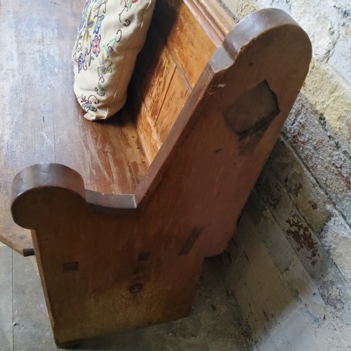 77 - A pitch pine church pew 191cm W x 74cm H x 50cm D