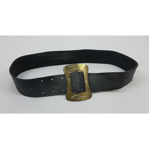 158 - A large leather belt and brass buckle chased with latitude and longitude 'Anno Domini 1759'