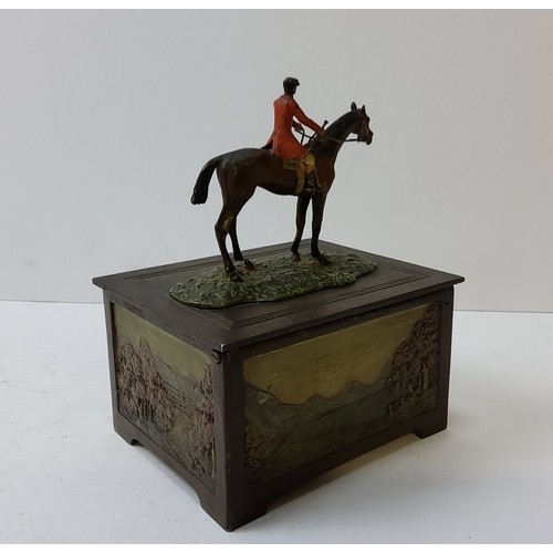 161 - Hunting Interest - an unusual early 20th century cold painted bronze mounted cigarette box, the hunt... 