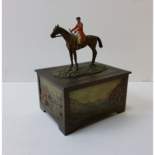 161 - Hunting Interest - an unusual early 20th century cold painted bronze mounted cigarette box, the hunt... 