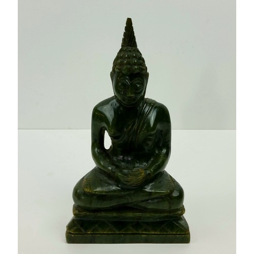 171 - World Travel - A spinach jade Buddha Shakyamuni, Tibet, 16cm high