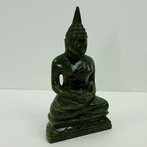 171 - World Travel - A spinach jade Buddha Shakyamuni, Tibet, 16cm high