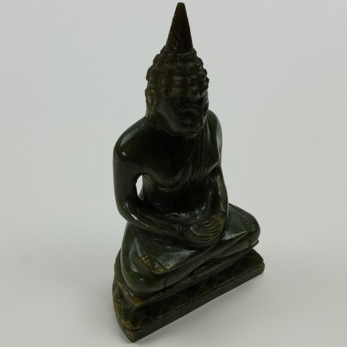 171 - World Travel - A spinach jade Buddha Shakyamuni, Tibet, 16cm high