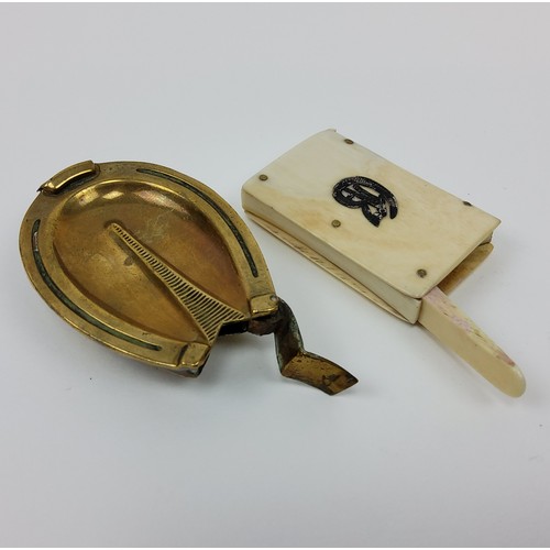 180 - A 19th century brass horse hoof vesta case; another 19th century marine ivory vesta case (2)