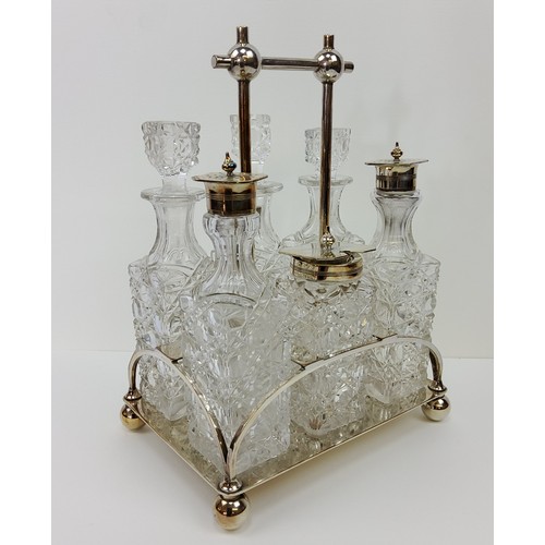 187 - A very good Victorian Sheffield silver plate six section hobnail cut cruet set c.1900