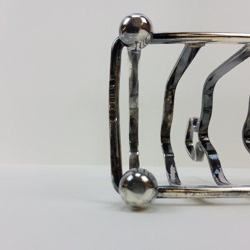 188 - An Elizabeth II silver four section toast rack, hallmarked for Birmingham 1941, Deakin & Fr... 