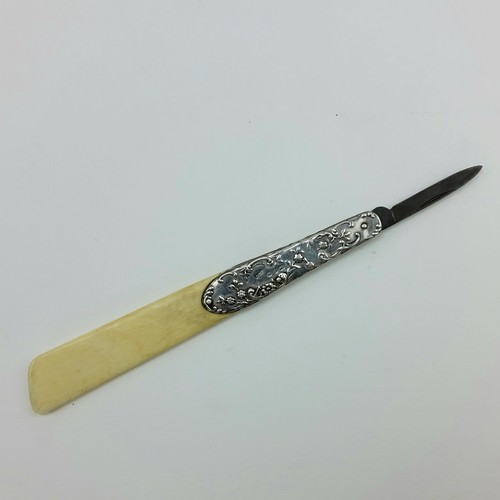 191 - A Victorian silver mounted ivory combination letter opener with folding steel knife blade, the decor... 