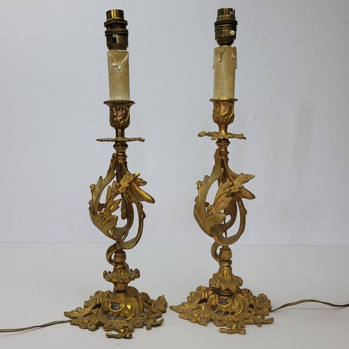 192 - A pair of decorative Louis XV Revival gilt metal lamp bases, pierced accanthus scrolling columns, 20... 