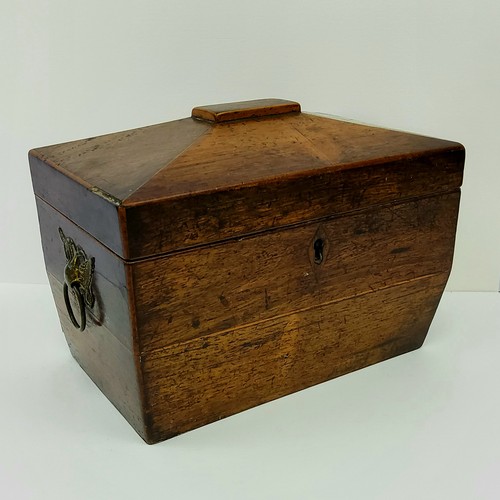 194 - An early 19th century walnut tea caddy, the brass double headed eagle escutcheons in the Empire tast... 