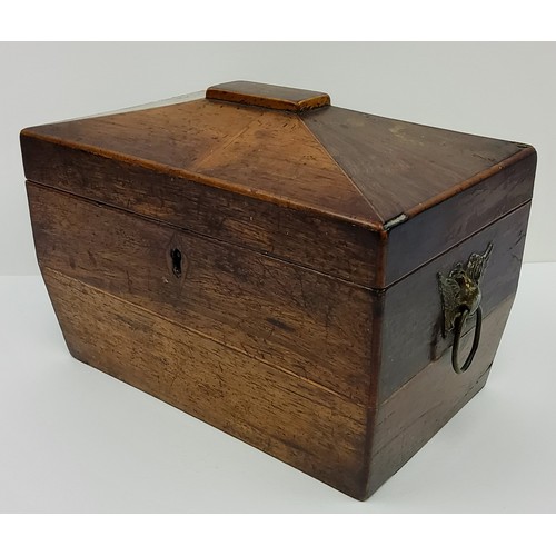 194 - An early 19th century walnut tea caddy, the brass double headed eagle escutcheons in the Empire tast... 