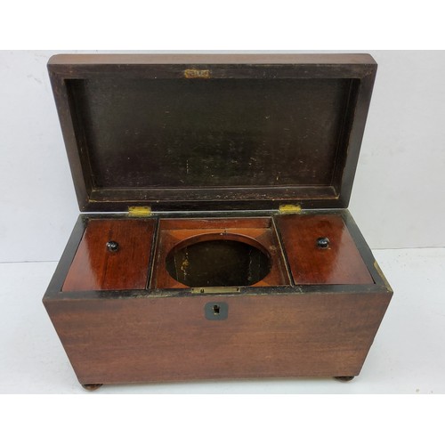 199 - A large George III mahogany sarcophagus tea caddy c.1820