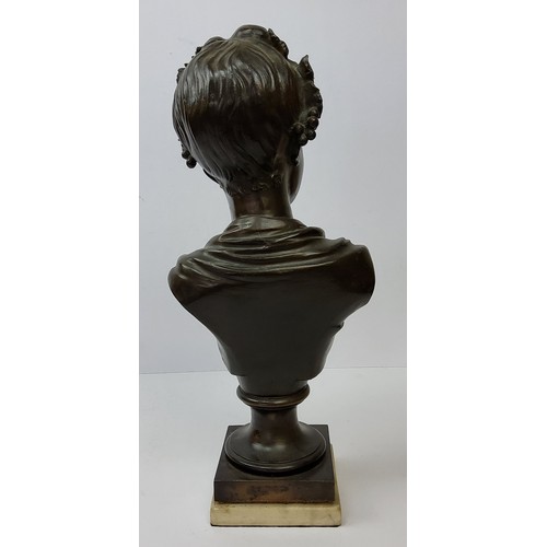 202 - A French pedestal bronze bust of a young woman with a garland of flowers in her hair, raised on carr... 