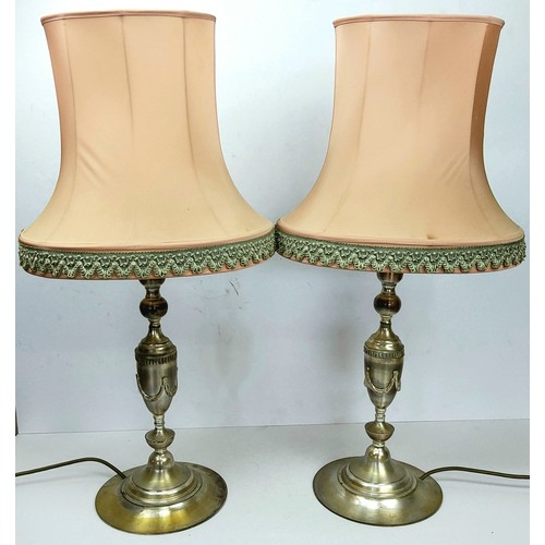 210 - A pair of Neo Classical style brushed silvered metal table lamps with pink shades, 20th century, 73c... 